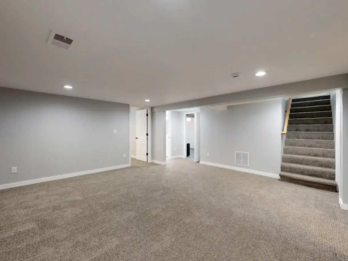 Finished and painted basement drywall in completed living space