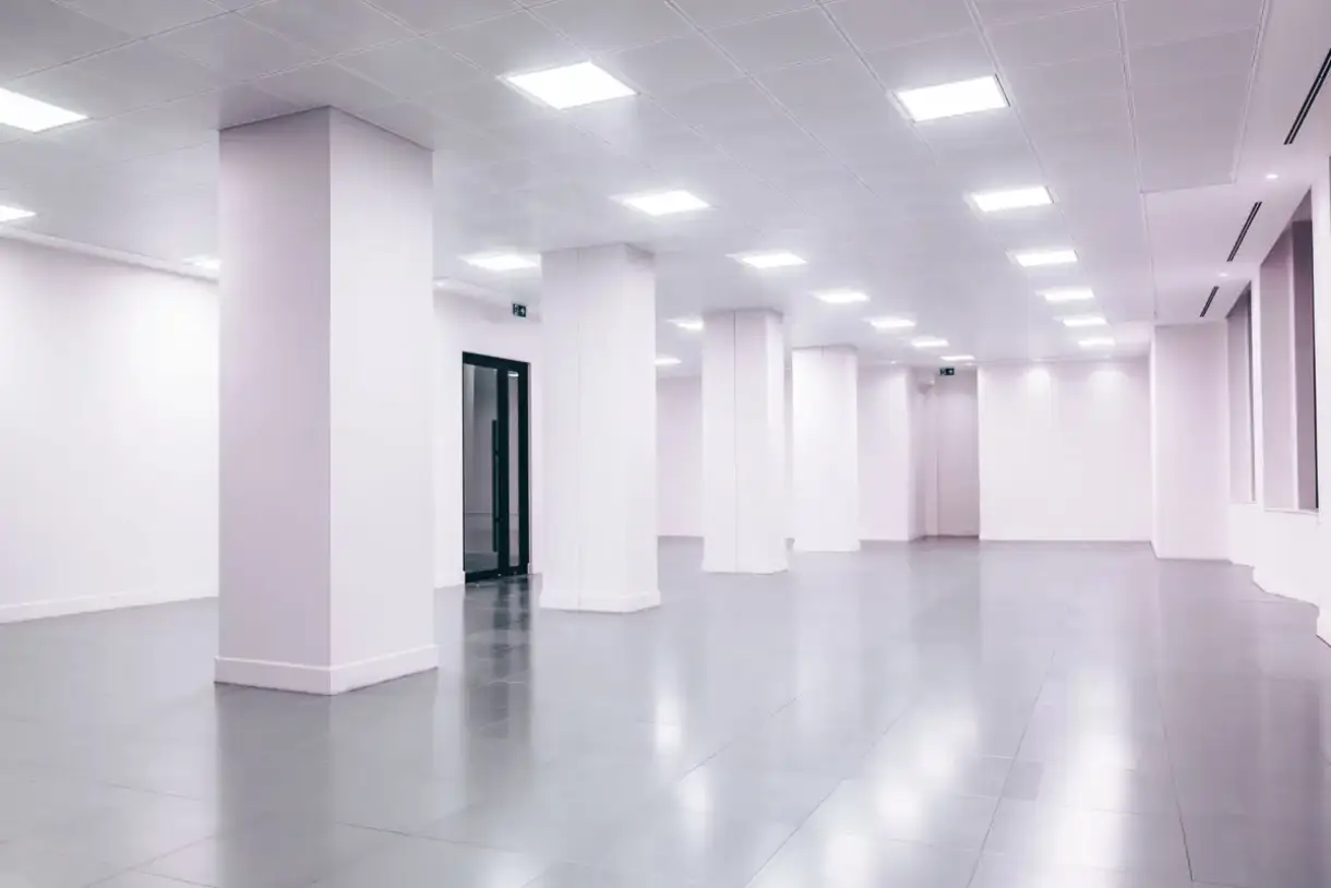 Finished office interior showing the even lighting that makes a mismatched repair visible