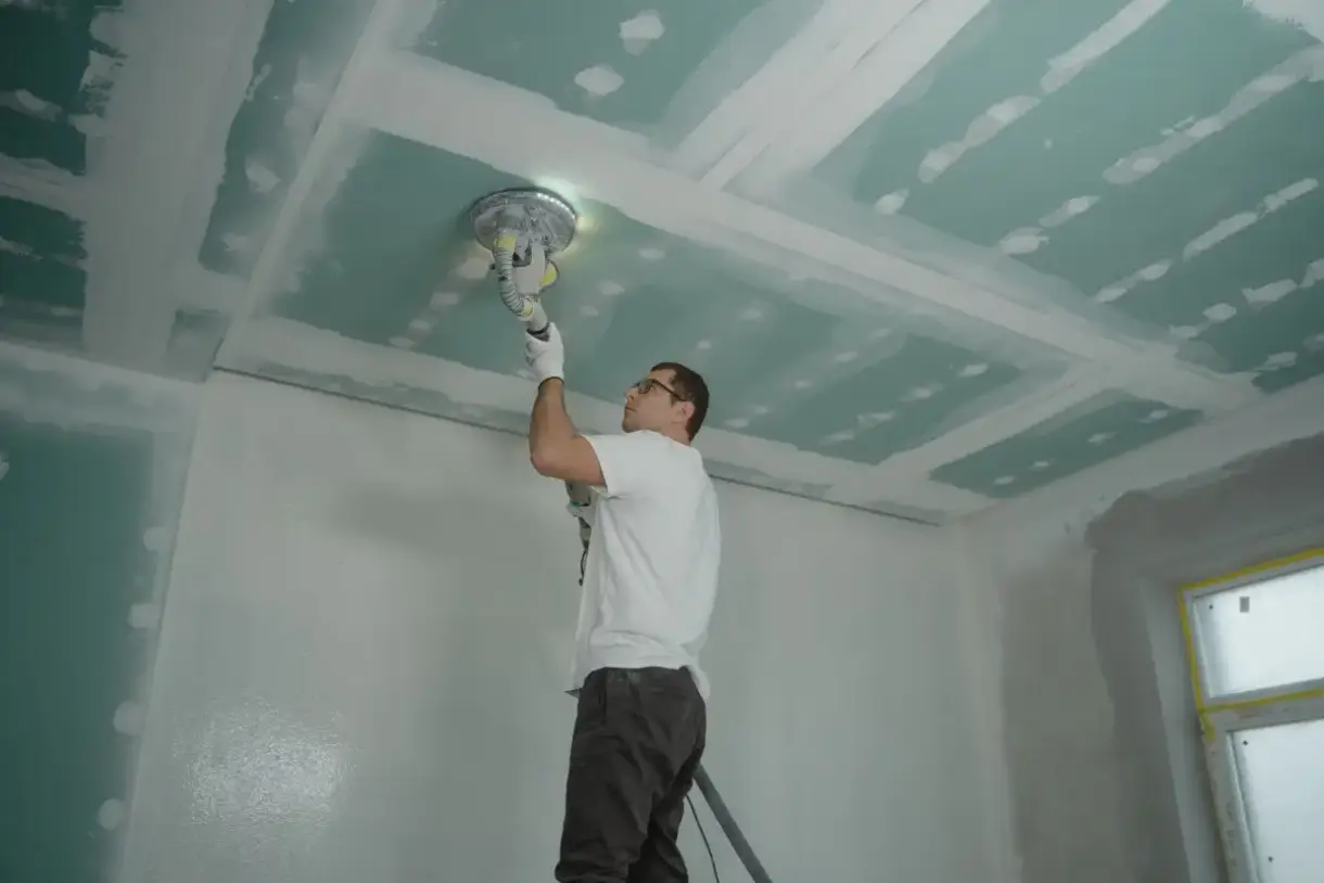 Replaced drywall section sanded and blended into the surrounding wall